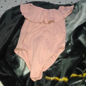 Pink body suit